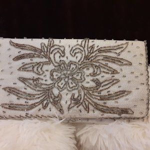 La Regale Silver Beaded clutch bag